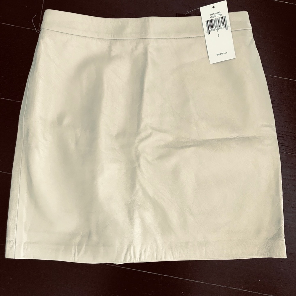 Brand new gold toned BCBG leather mini skirt